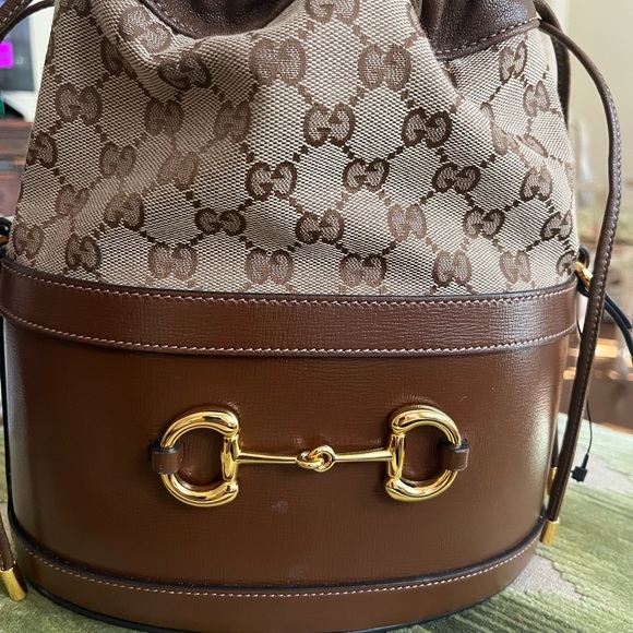Gucci Handbags - Gucci Drawstring Bucket Bag NWT Brown leather monogram Horsebit Buckle.